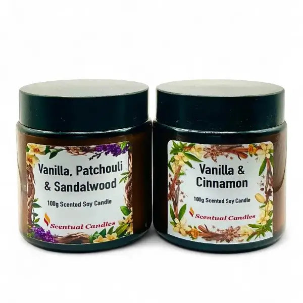 Two vanilla and spice scented candles with labels indicating fragrance types on a white background