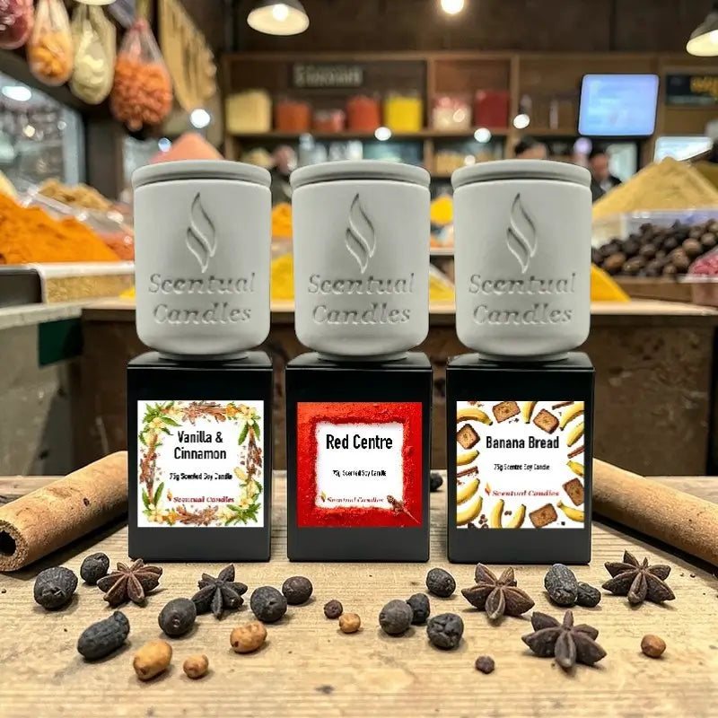 Warm and Spicy Scented Candles set with Vanilla and Cinnamon, Red Centre, Banana Bread fragrances on display.
