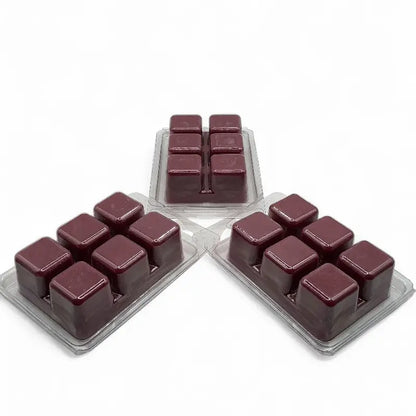 Wax Melts scented 6 cube packs in deep burgundy color on display.