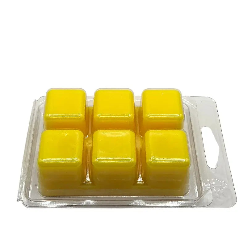 Wax Melts - Scented 6 Cube Packs in yellow, perfect for home fragrance, placed on a clear plastic tray.