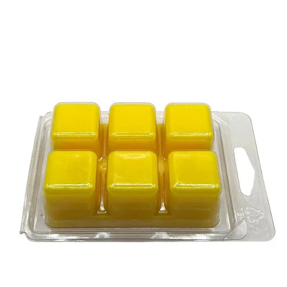 Wax Melts - Scented 6 Cube Packs in yellow, perfect for home fragrance, placed on a clear plastic tray.