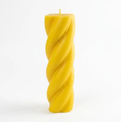 Customisable Candle - Extra Large Column in yellow twist design, perfect for home decor or special events.