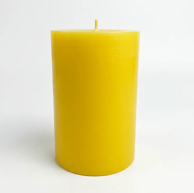 Extra Large Pillar Candle in yellow, 1.1kg with customizable scent, perfect for home decor and lasting fragrance.