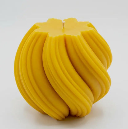 Extra large Ball Candle in bright yellow with a sculptural design, perfect for home decor and fragrance.