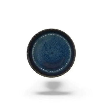 Blue ceramic candle holder plate on a white background