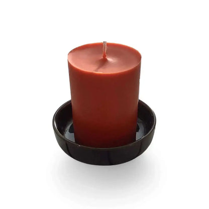 Ceramic Candle Holder Plate 9cm in black with a red candle displayed.