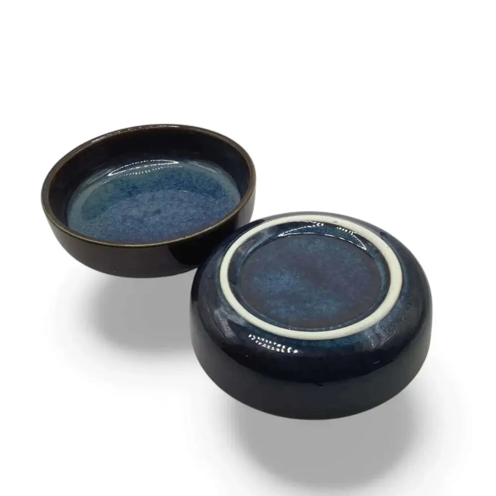 Ceramic Candle Holder Plates 9cm in black with blue accent on a white background.