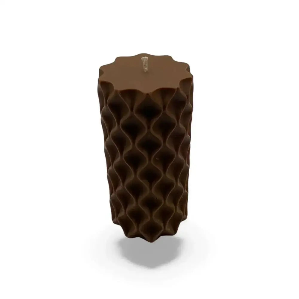 Chocolate candles scented soy pillar with wavy texture design.