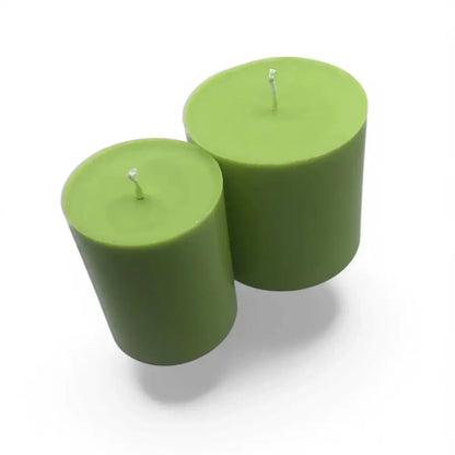 Set of two green fruit scented soy candle set, smaller and larger size.