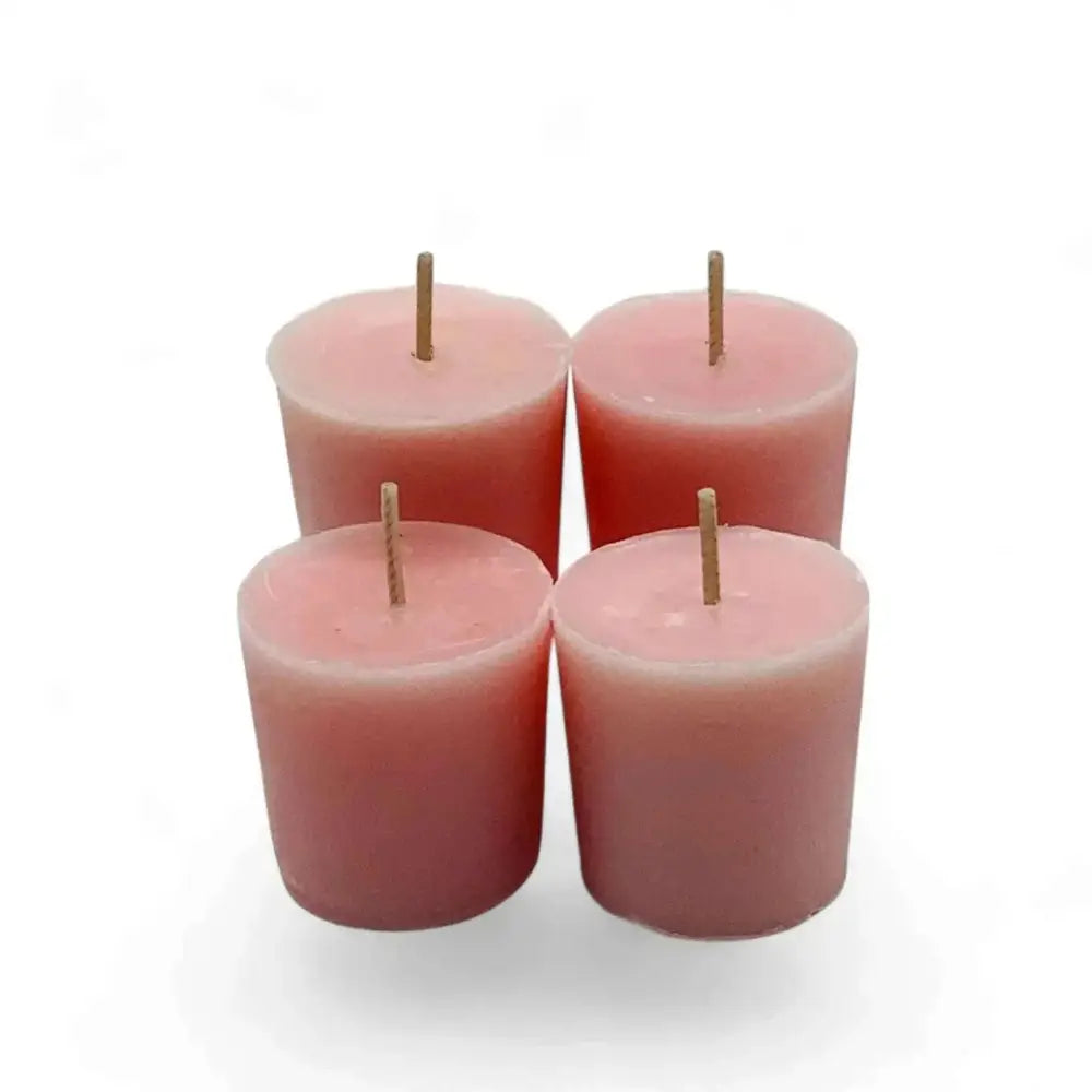 Honeysuckle votive candles, pink color, set of four.