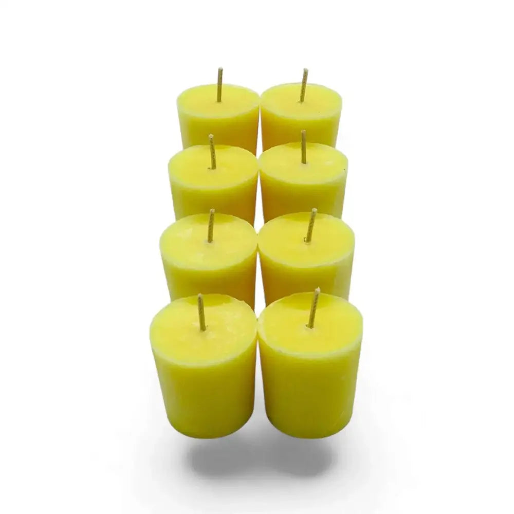 Jasmine scented soy votive candles arranged in a group, yellow hue.