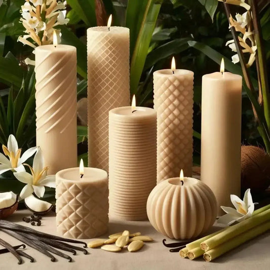 Vanilla scented soy pillar candles in various designs and sizes, surrounded by vanilla pods and blooms, offering an elegant and cozy atmosphere.