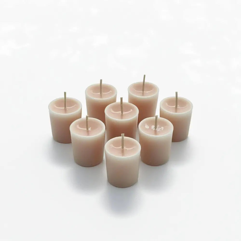 Vanilla Votive Candles made from coconut/soy wax blend, offering warm and creamy fragrance.