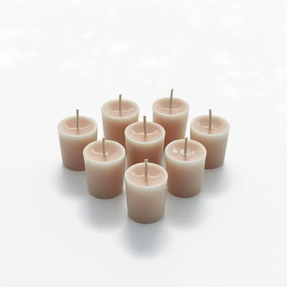 Vanilla Votive Candles made from coconut/soy wax blend, offering warm and creamy fragrance.