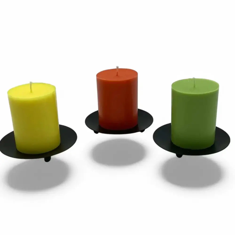 Nordic-inspired round wrought iron candle holder with colorful candles.