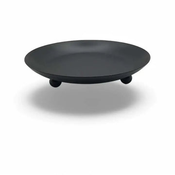 Round wrought iron candle holder with matte black finish, minimalist Nordic design.