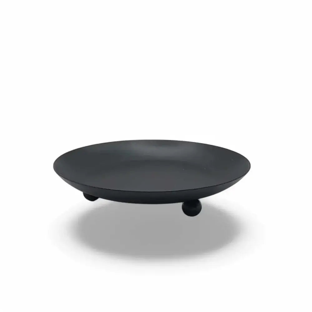 Round Wrought Iron Candle Holder in matte black, minimalist Nordic design.